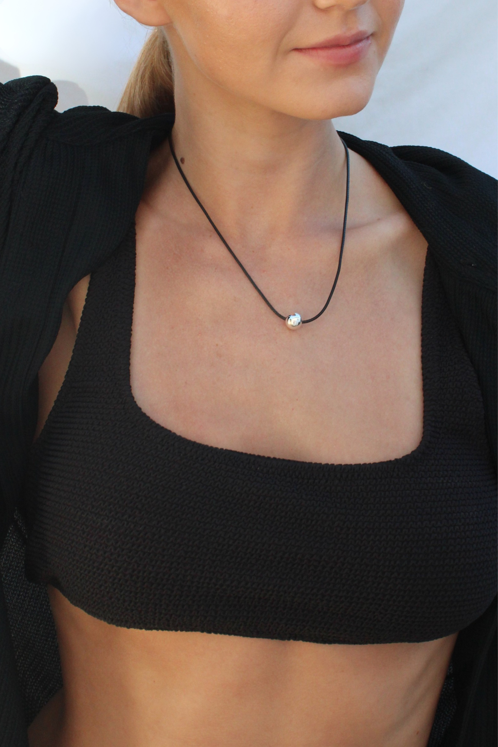 Porto Necklace, minimal silver bead pendant on adjustable black cord by Zoila