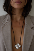 Cosmic Pendant, sculptural silver pendant on adjustable black cord by Zoila